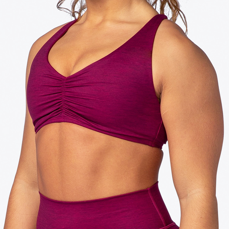 https://www.aikasportswear.com/v-neck-sports-bra-custom-high-stretch-front-ruched-sexy-cross-back-yoga-bra-product/