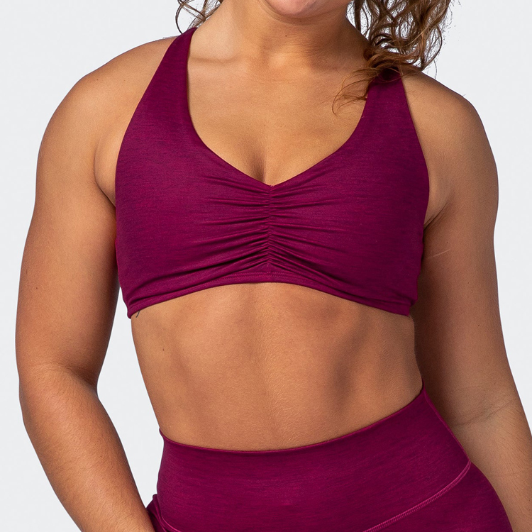 V Neck Sports Bra သည် စိတ်တိုင်းကျ ဆန့်တန်းထားသော ရှေ့မျက်နှာစာဖြစ်ပြီး Sexy Cross Back Yoga ဘရာစီယာ